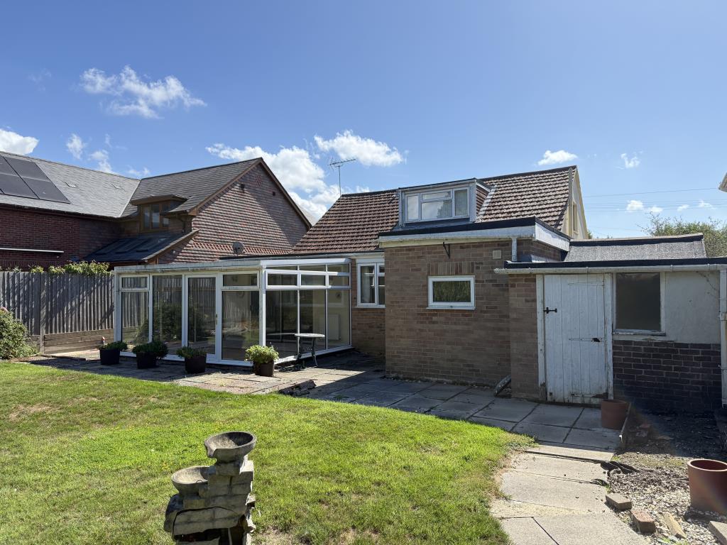 Lot: 109 - FOUR-BEDROOM DETACHED BUNGALOW FOR IMPROVEMENT ON 0.21 ACRES - Rear of bungalow showing conservatory